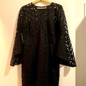 Black, detailed mid-length cocktail dress